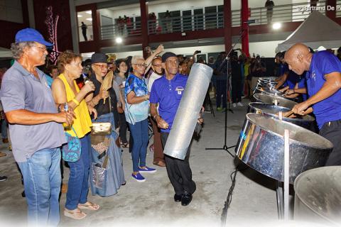 Host Steel band Desperadoes entertaining a grateful crowd.